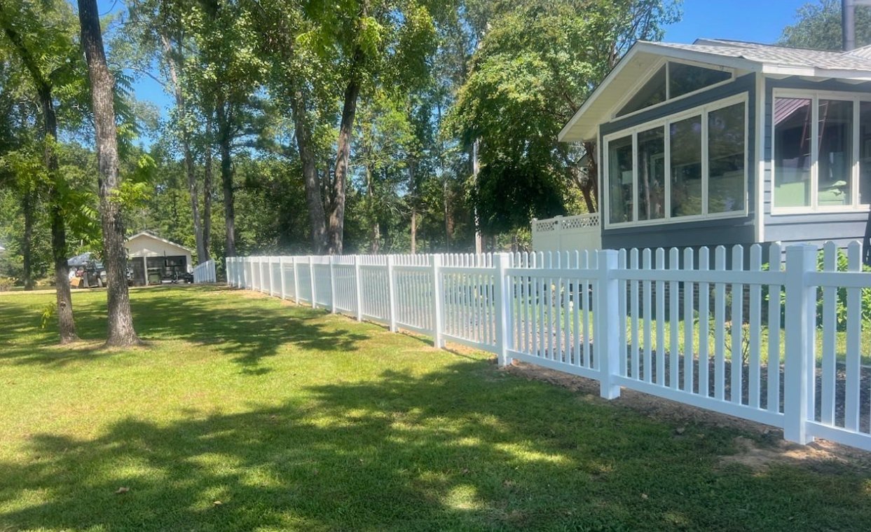 White vinyl picket fence installation